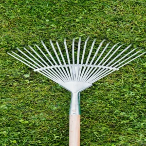 top-view-love-rake-on-ground